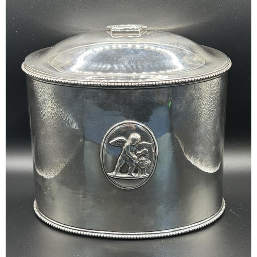 20 - A George III silver tea caddy, of oval form, decorated classical scenes, crested and inscribed, Lond... 