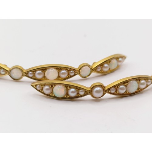 623 - A pair of yellow metal, seed pearl and opal mounts, 60 mm wide (2)