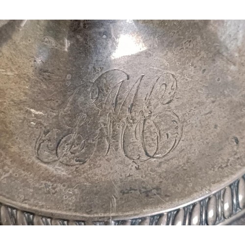 28 - A pair of George III silver candlesticks, monogrammed, Sheffield 1797, 31 cm high (2)