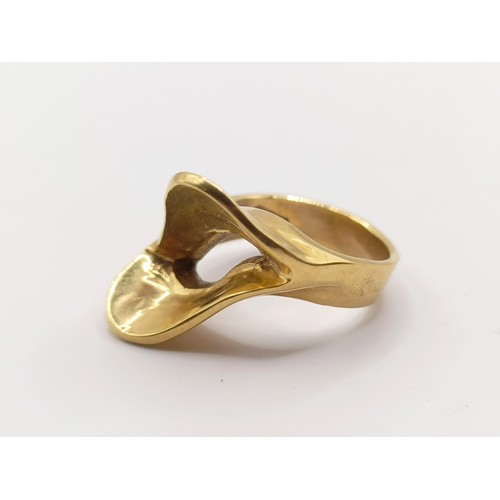 627 - A 20th century 18ct gold abstract ring, ring size G, 7.0 g