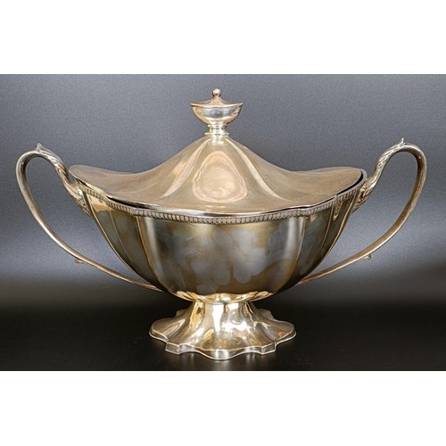 36 - A silver plated two handled tureen, a set of four silver plated coasters, and assorted silver plate ... 