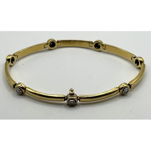 629 - An 18ct gold and diamond bracelet, 19.7 g (all in)