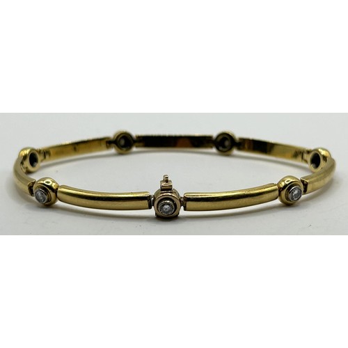 629 - An 18ct gold and diamond bracelet, 19.7 g (all in)