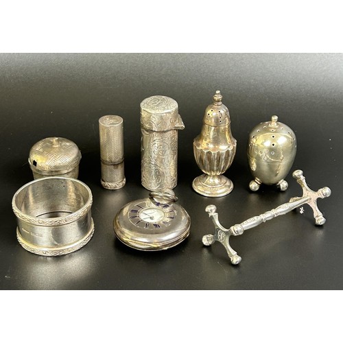 37 - A silver lipstick holder, a silver cased perfume bottle, a half hunter pocket watch, a napkin ring, ...