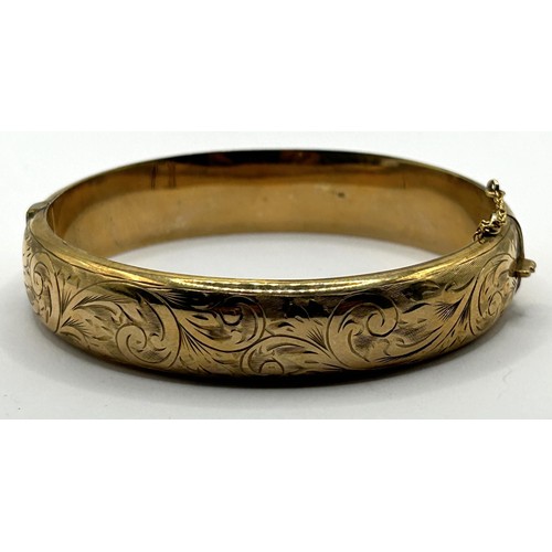 634 - A 9ct gold bangle, 14.8 g