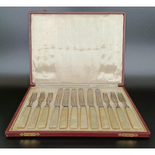 57 - A set of six Victorian dessert forks and knives, with mother of pearl handles, Sheffield 1887, cased... 