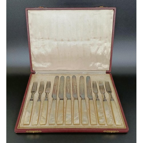 57 - A set of six Victorian dessert forks and knives, with mother of pearl handles, Sheffield 1887, cased... 