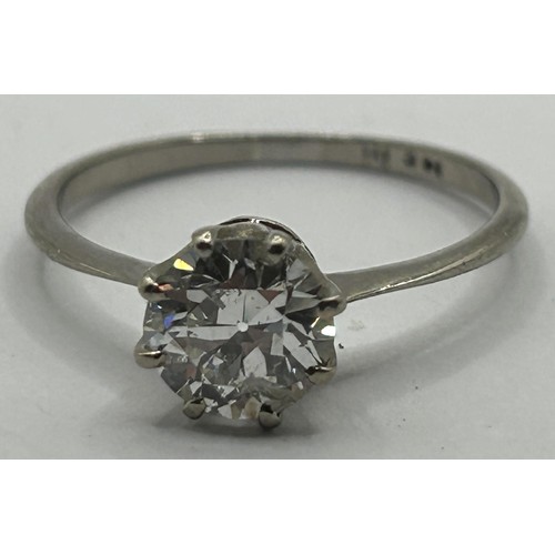 647 - An 18ct white gold and diamond solitaire ring, ring size N, in a vintage jewellery box, with a retai... 