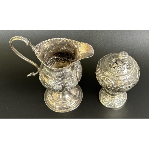 59 - A George III silver caddy, London 1813, 2.7 ozt, 10 cm high, and an 18th century Continental silver ... 