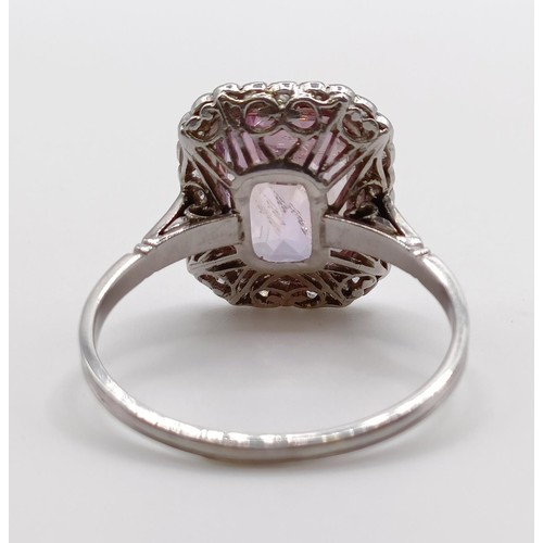 657 - An early 20th century pink sapphire and diamond ring, with a vintage ring box