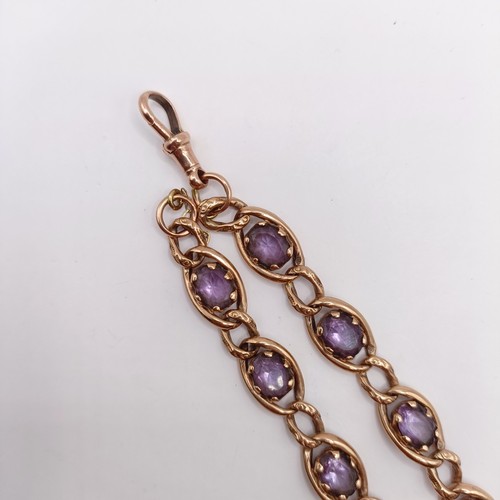 673 - A 9ct gold and paste braceletNOTE change of description not Amethyst