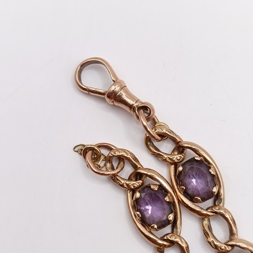 673 - A 9ct gold and paste braceletNOTE change of description not Amethyst