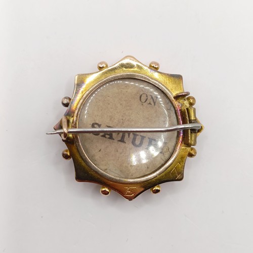 753 - A late 19th/early 20th century yellow metal and diamond memorial brooch