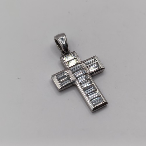 756 - An 18ct white gold and baguette cut diamond cross pendant