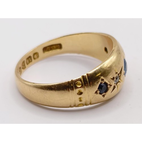 760 - An 18ct gold, diamond and sapphire gypsy set ring, ring size O, 4.4 g (all in)