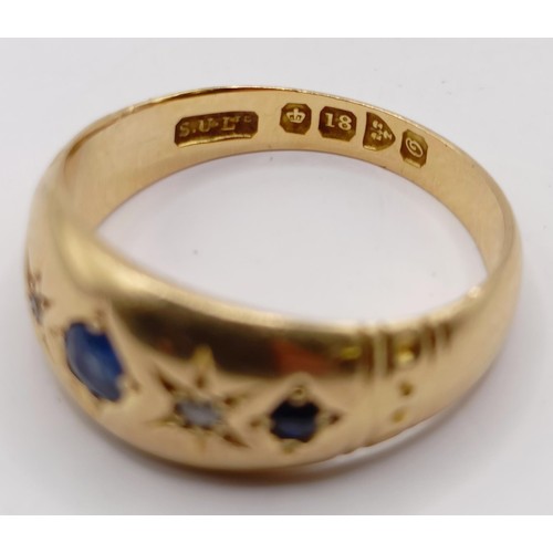 760 - An 18ct gold, diamond and sapphire gypsy set ring, ring size O, 4.4 g (all in)