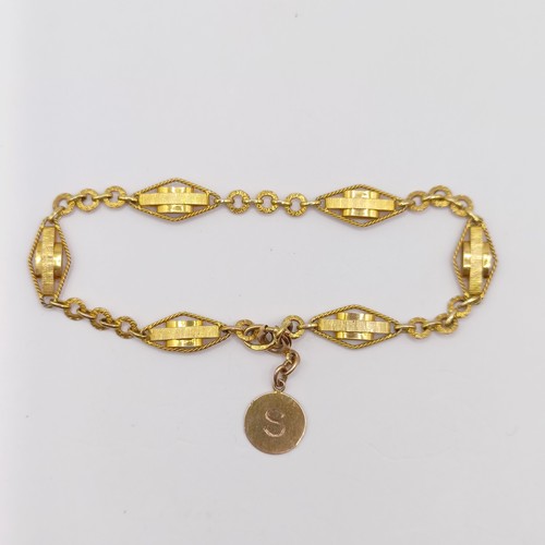 773 - An Indian yellow metal bracelet