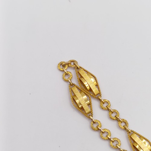 773 - An Indian yellow metal bracelet