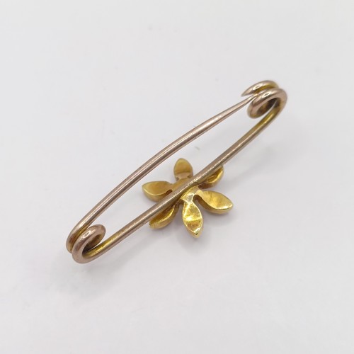 778 - An early 20th century yellow metal and seed pearl bar brooch, in a vintage jewellery box