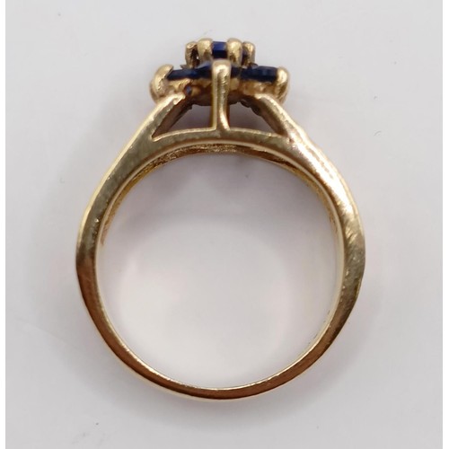 788 - A 9ct gold and blue stone ring, ring size E, and a yellow metal and white stone ring, ring size K (2... 