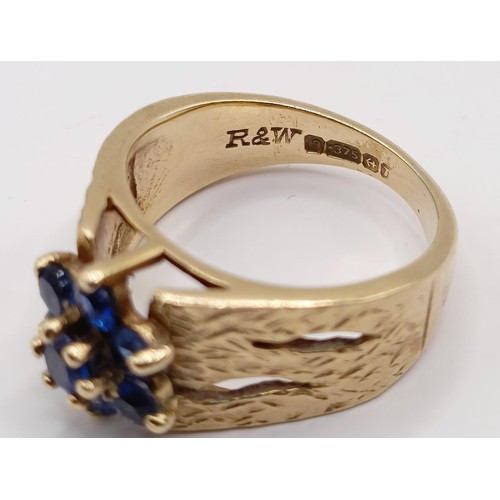 788 - A 9ct gold and blue stone ring, ring size E, and a yellow metal and white stone ring, ring size K (2... 