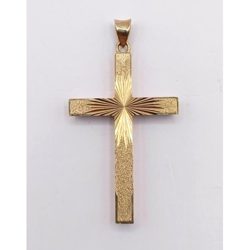 793 - A 9ct gold cross pendant, 5.1 g