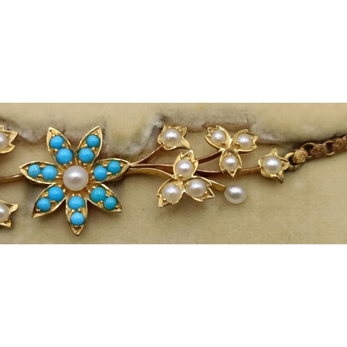 802 - A late 19th/early 20th century yellow metal, turquoise and seed pearl floral necklace, in a fitted j... 