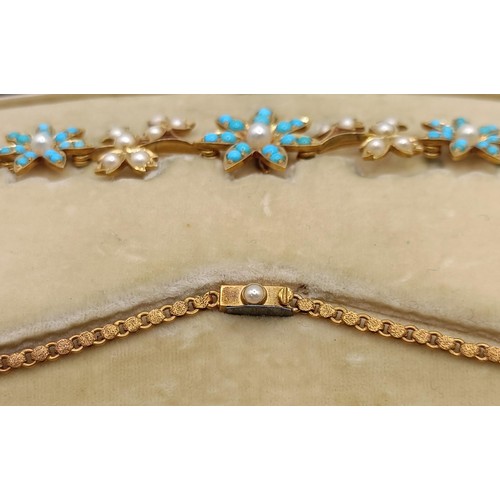 802 - A late 19th/early 20th century yellow metal, turquoise and seed pearl floral necklace, in a fitted j... 