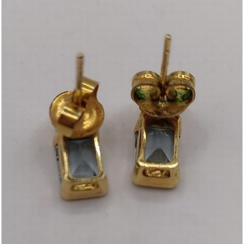 702 - A pair of 18ct gold, aquamarine and diamond earrings