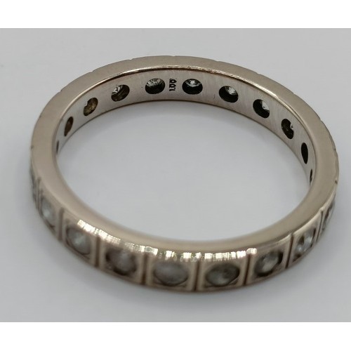 704 - An 18ct gold and diamond eternity ring, ring size M