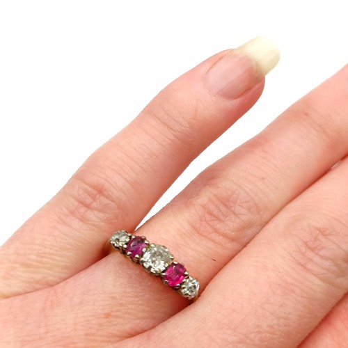 705 - An 18ct gold, ruby and diamond five stone ring, ring size L