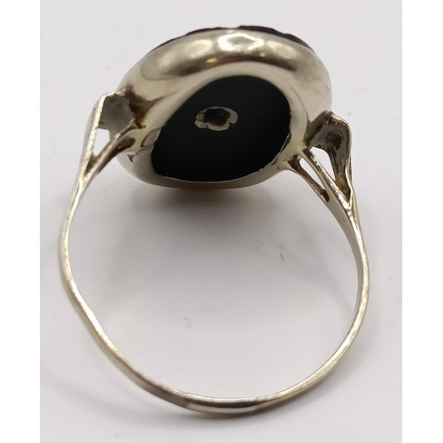 708 - An Art Deco 14ct gold, diamond and onyx ring, ring size O