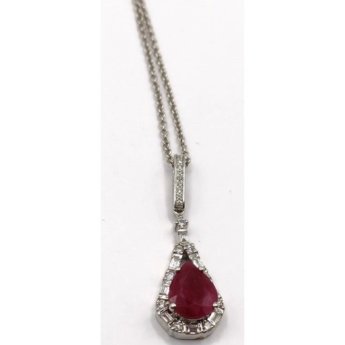 709 - An 18ct white gold, diamond and ruby necklace