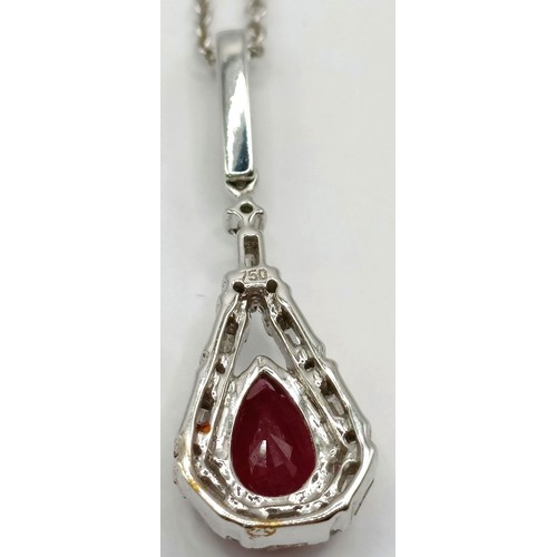 709 - An 18ct white gold, diamond and ruby necklace