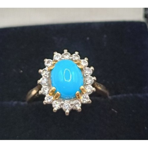 713 - An 18ct gold, turquoise and diamond ring, ring size N