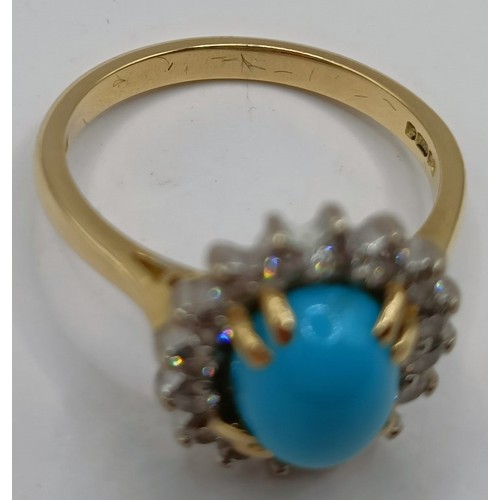 713 - An 18ct gold, turquoise and diamond ring, ring size N