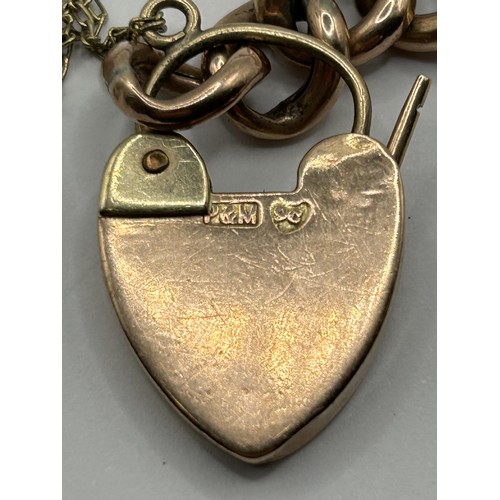 718 - A 9ct gold bracelet, with a heart shape padlock clasp, 14.4 g