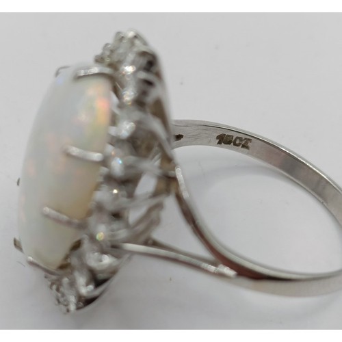 722 - An 18ct white gold, opal and diamond ring, ring size P