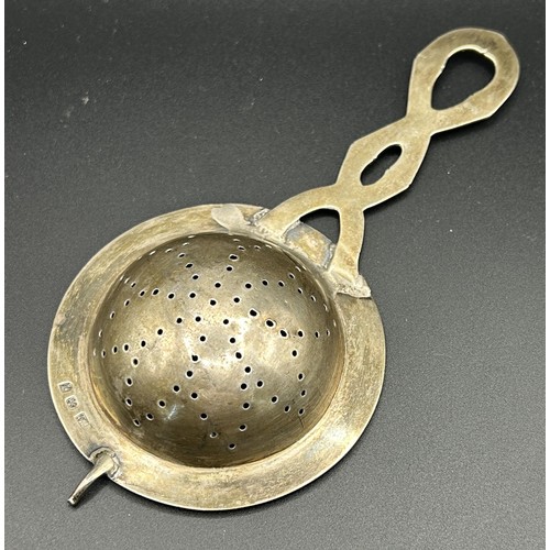 93 - A Chinese silver coloured metal tea strainer, 1.3 ozt