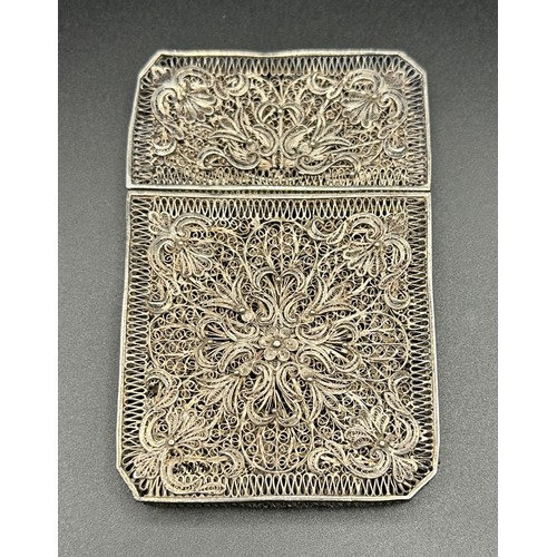 96 - A Chinese silver coloured metal filigree card case, 9 cm high