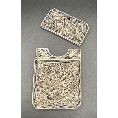 96 - A Chinese silver coloured metal filigree card case, 9 cm high