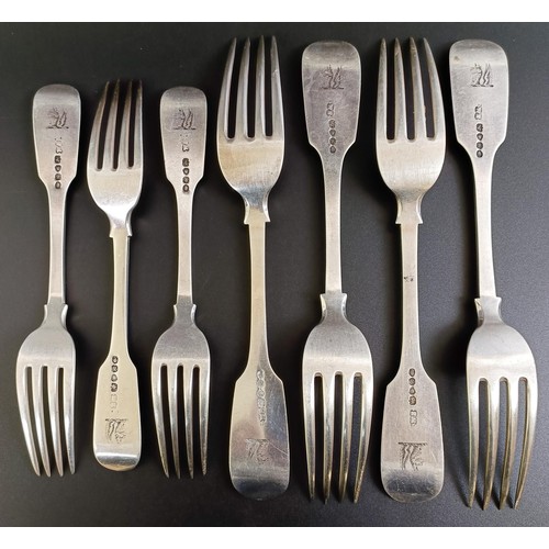 102 - A set of four William IV silver fiddle pattern table forks, and three dessert forks, London 1836, 14... 