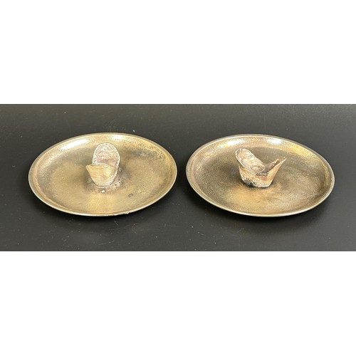 103 - A pair of Chinese silver coloured metal pin dishes, with attached silver coloured metal weights, 159... 