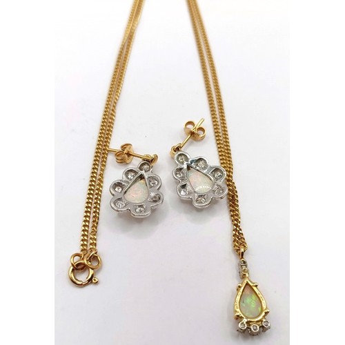 741 - An 18ct gold opal and diamond pendant, on a chain, and a pair of opal earrings