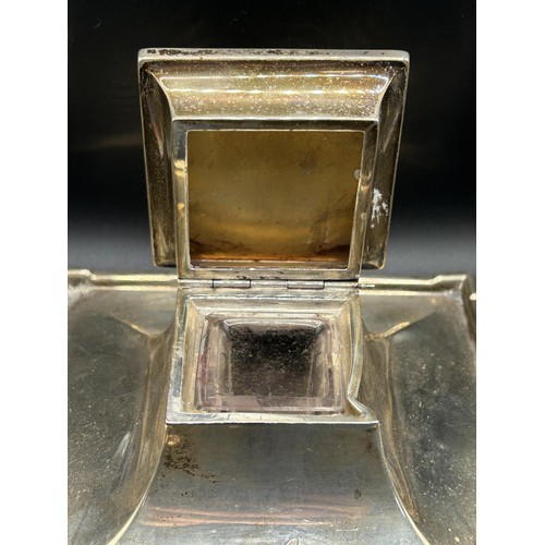 111 - An Art Deco silver desk inkwell, of square form, initialled, Birmingham 1928, 20.5 ozt (all in), 12.... 