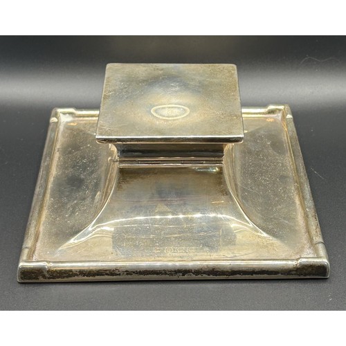 111 - An Art Deco silver desk inkwell, of square form, initialled, Birmingham 1928, 20.5 ozt (all in), 12.... 