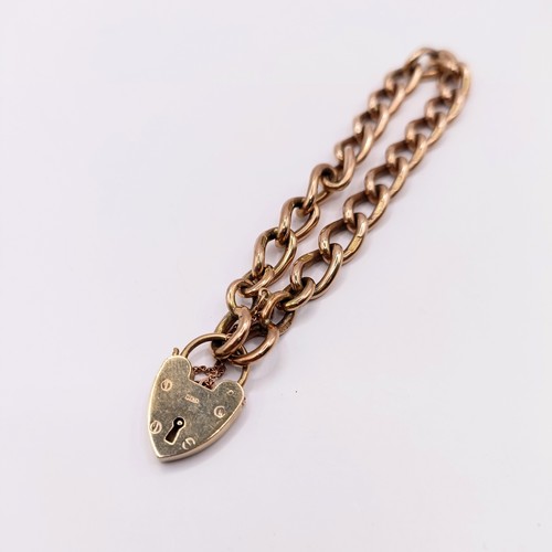 683 - A 9ct gold bracelet, with a heart shaped padlock clasp, 25.3 g