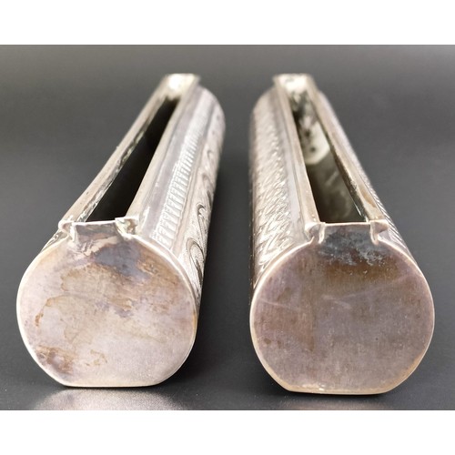 116 - A pair of Persian silver coloured metal posy holders, 19 cm wide (2)