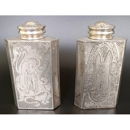 123 - A pair of Continental silver coloured metal triangular caddies, engraved foliate forms and birds, 12... 