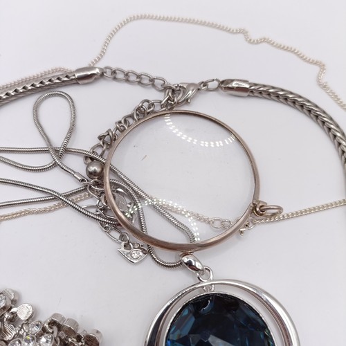 829 - A 20th century paste and blue stone pendant, by Fiorelli, a paste set necklace and assorted silver a... 